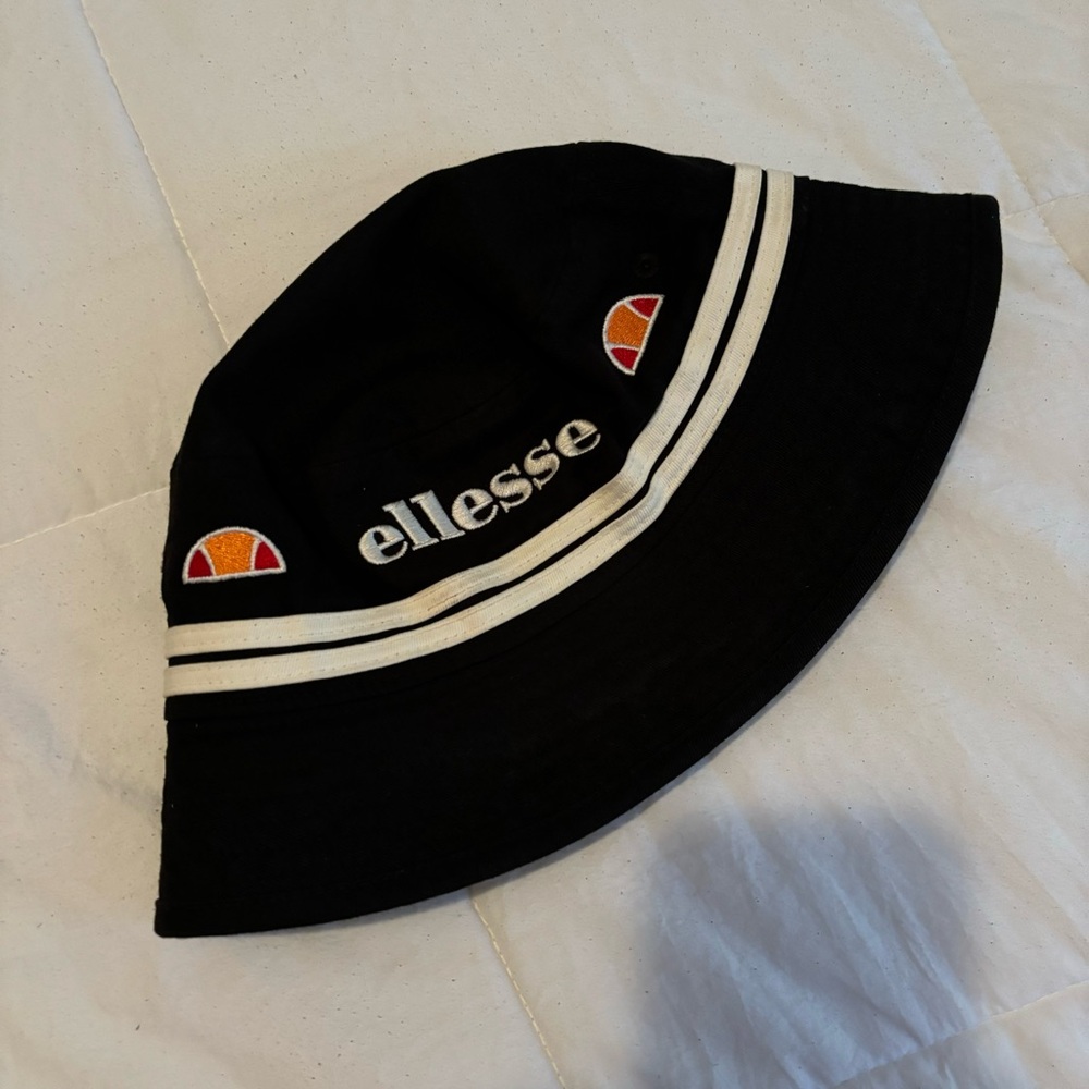 Ellesse Black Bucket Hat with White Stripes and Orange Logo Accents